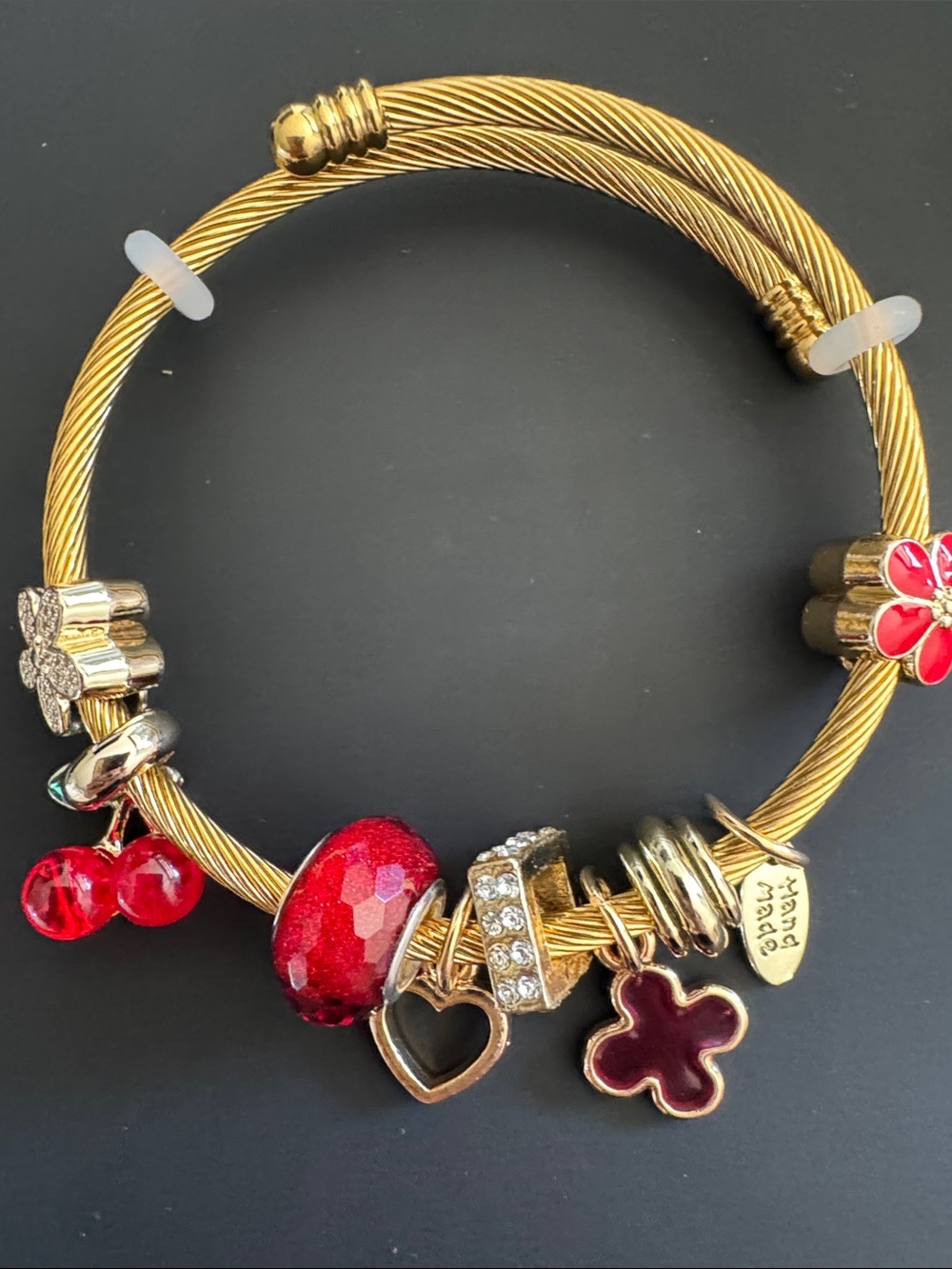 Gold-Tone Charm Bracelet with Red Accents